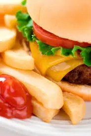 close up of a cheeseburger and fries