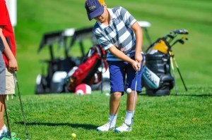 young golfer swinging